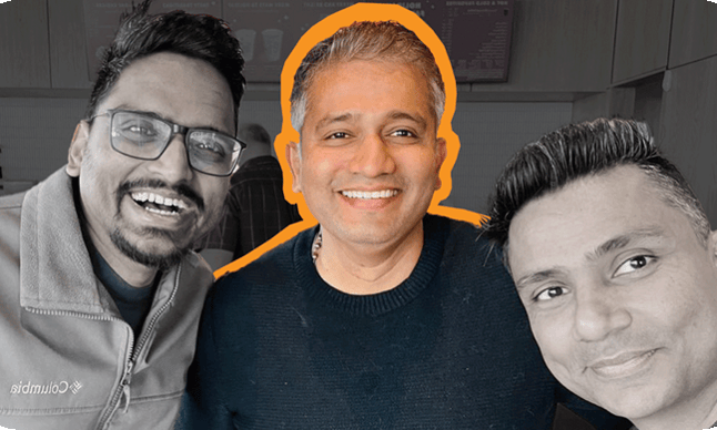 Three men smiling at the camera, with the man in the center highlighted with an orange outline.